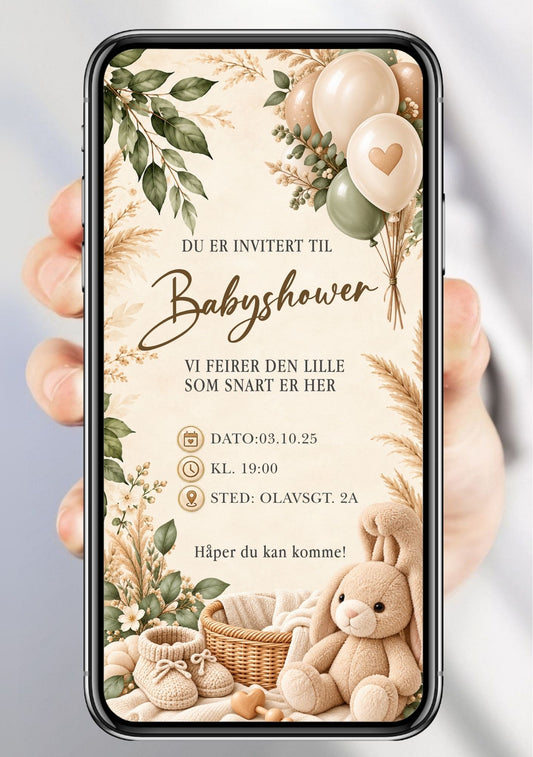 Digital babyshower-invitasjon på beige/kremhvit bakgrunn med pampagress og grønne eukalyptusblader, kremballonger med hjerte øverst til høyre, flettekurv med babyteppe, babysokker og kanintøy nederst, "Du er invitert til Babyshower" i elegant håndskrift og festdetaljer