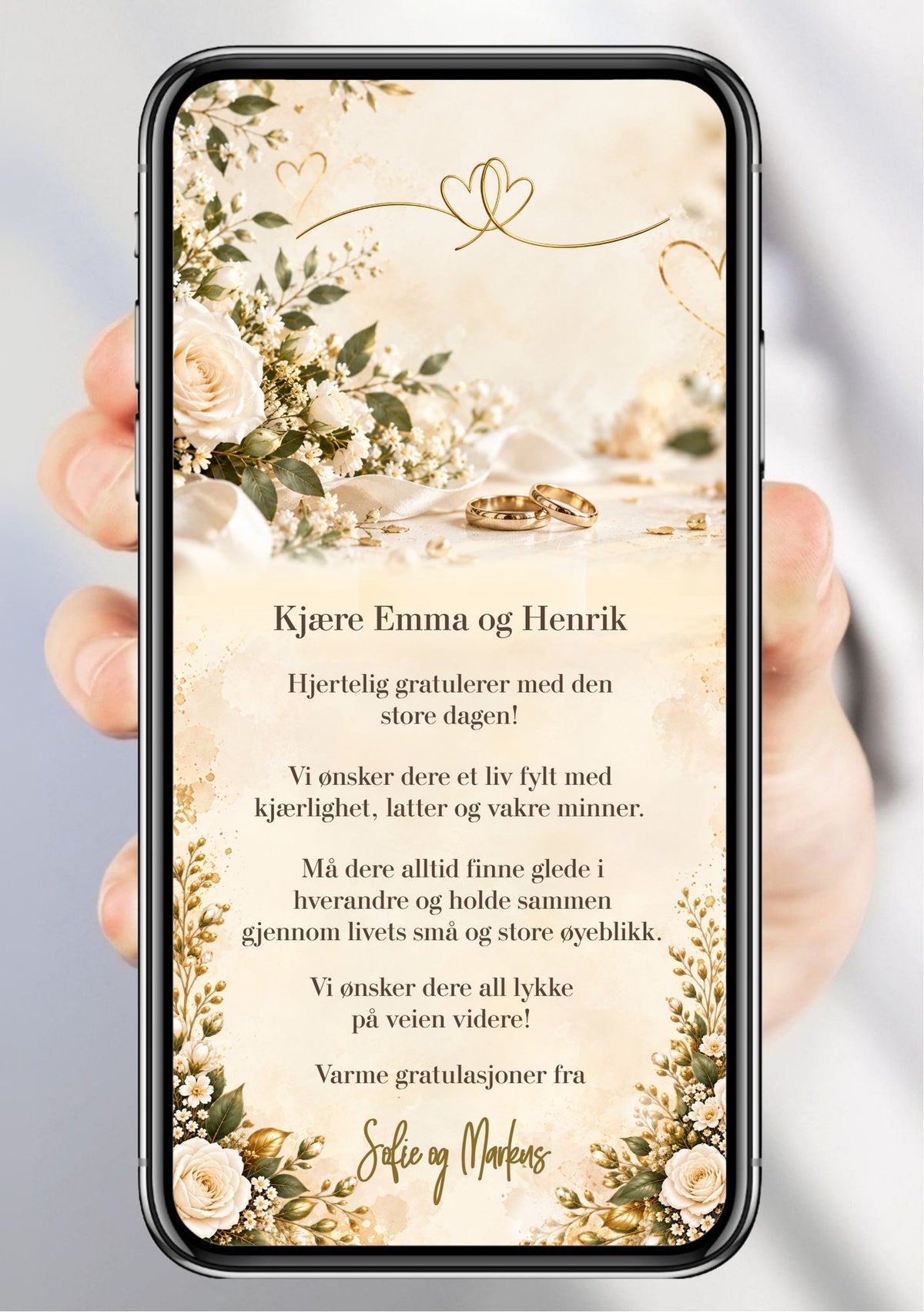 Gratulasjonskort til brudepar vist på mobil, med kremhvite roser, grønne blader, gullringer og sammenflettede gullhjerter.